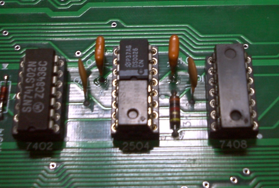 1.0uF bypass capacitors adjacent to the DS0025/DS0026