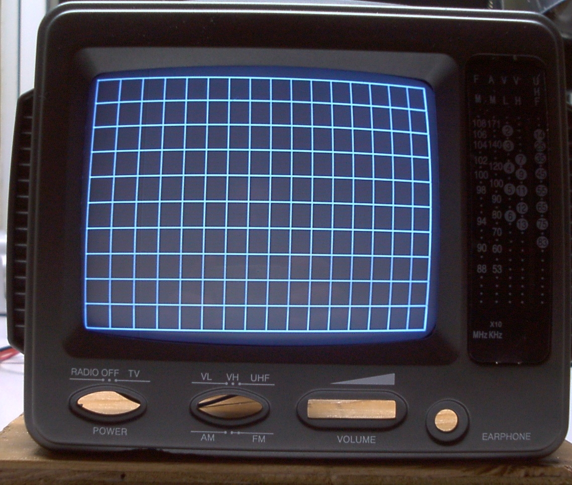Little monitor showing a grid test pattern