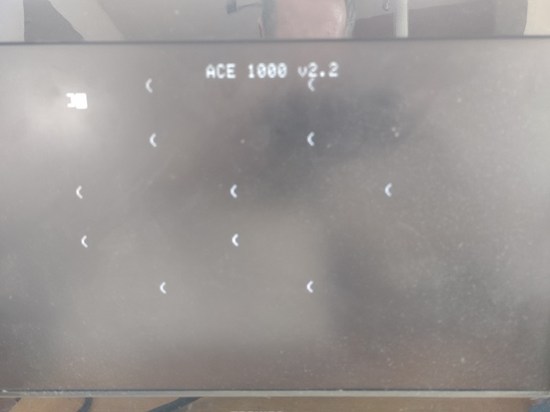 Franklin Ace 1000 boot screen with scattered left parenthesis characters
