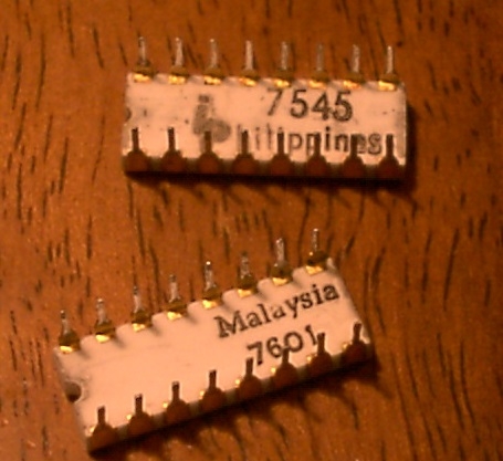 Bottom side of Intel 2104 DRAMs showing date codes