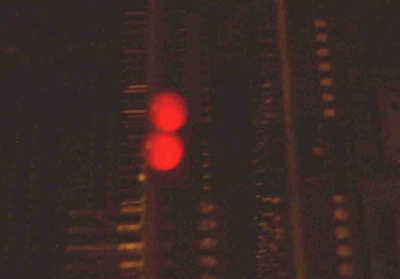 Closeup up of evil glowing red LEDs indicating a fault