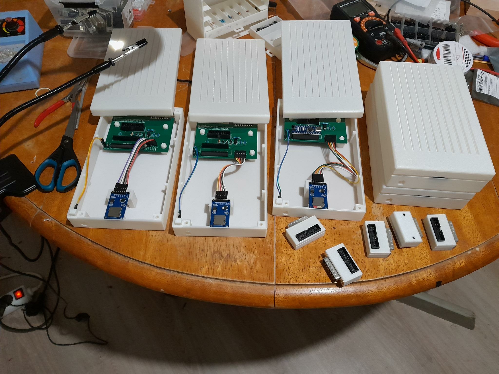 A picture of my "workbench" with 5 units in various stages of assembly
