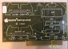 yellow line follows circuit from edge connector pin 18 to LS245 pin 1